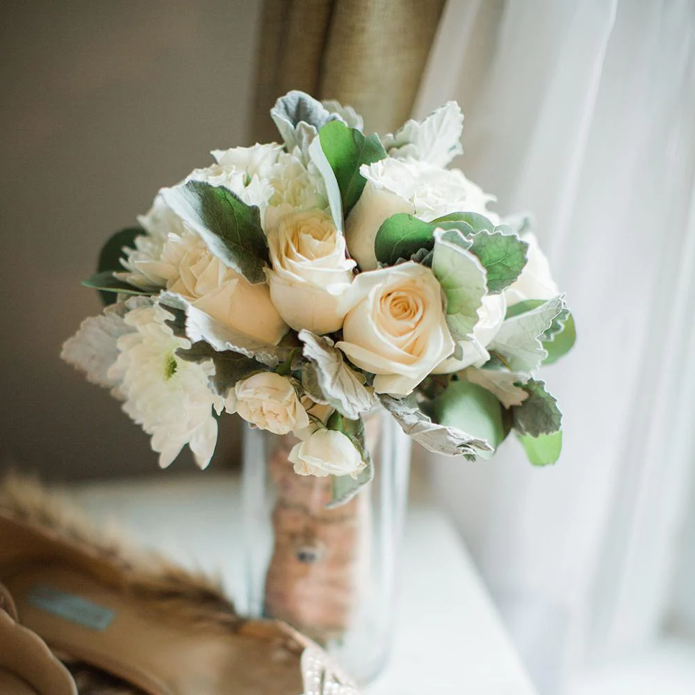 celebratory arrangement obx wedding flowers