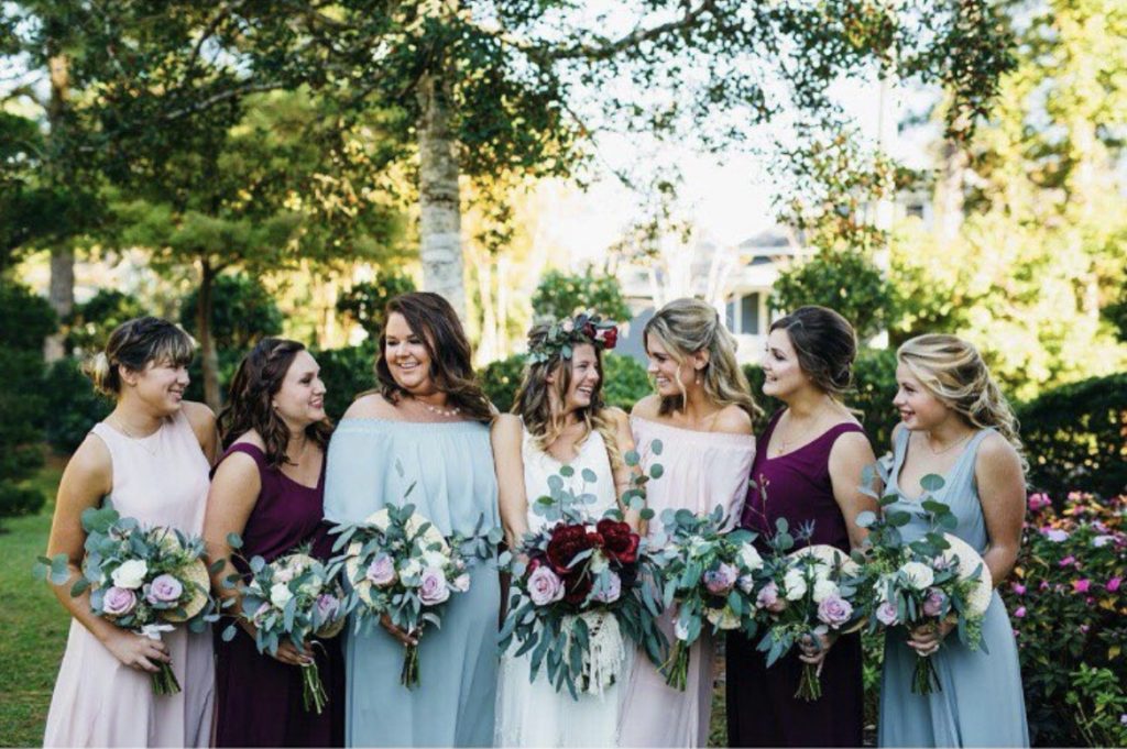 bride and bridesmaids obx wedding flowers