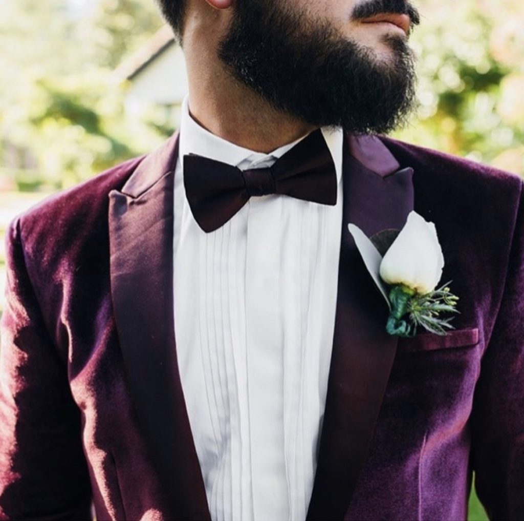 maroon groom tuxedo with boutonniere obx wedding flowers design